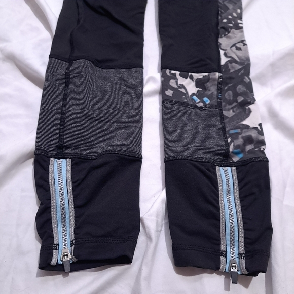 Lululemon | Black multicolored asymmetrical leggings with zippers - Picture 2 of 10